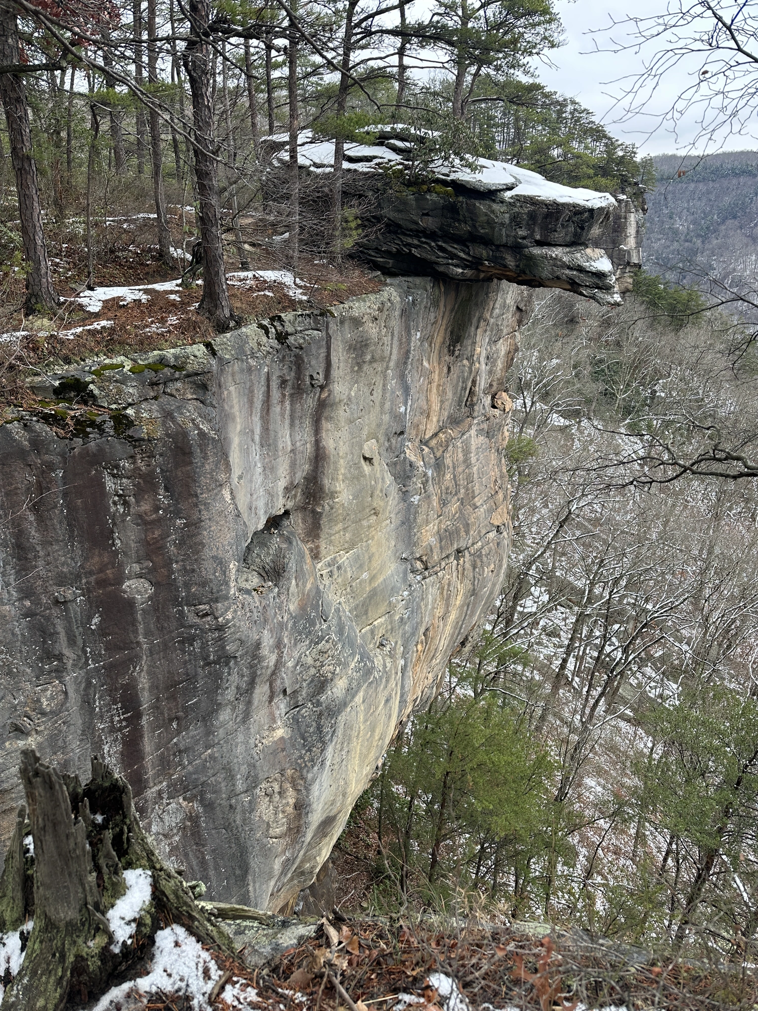 A rock wall with climbing chalk residue