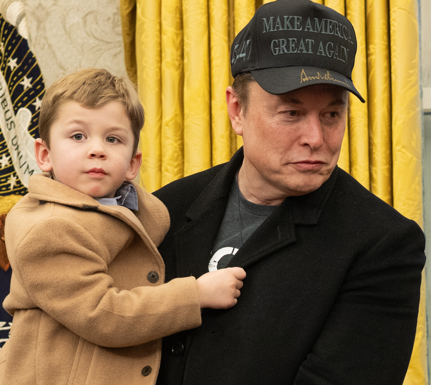 &lsquo;Elon Musk holds his four-year-old son in the Oval Office.&rsquo;
