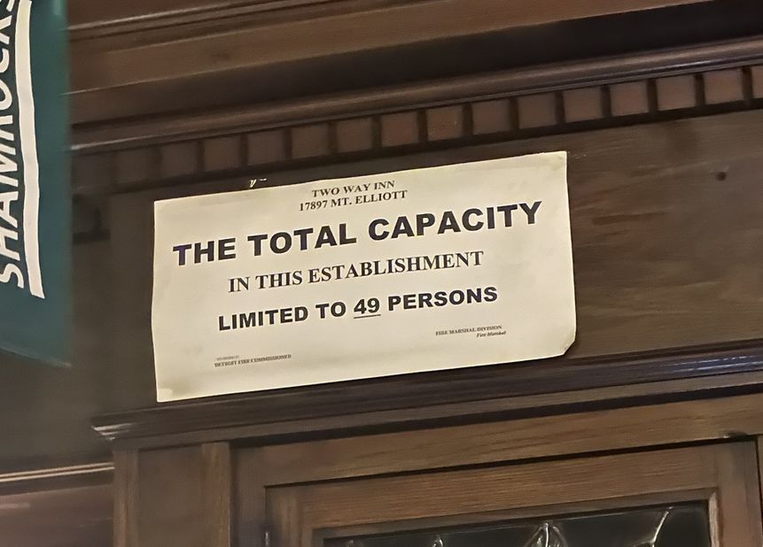 Sign saying capacity: 49 people